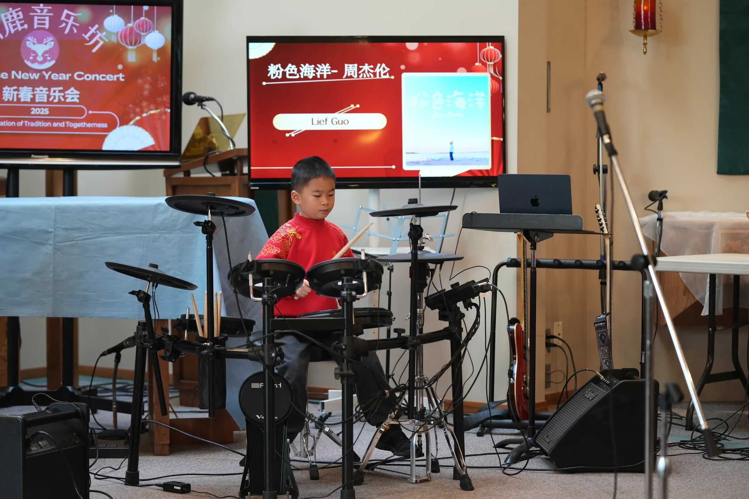 Student performance moment from Reindeer Education's 2025 public gallery.