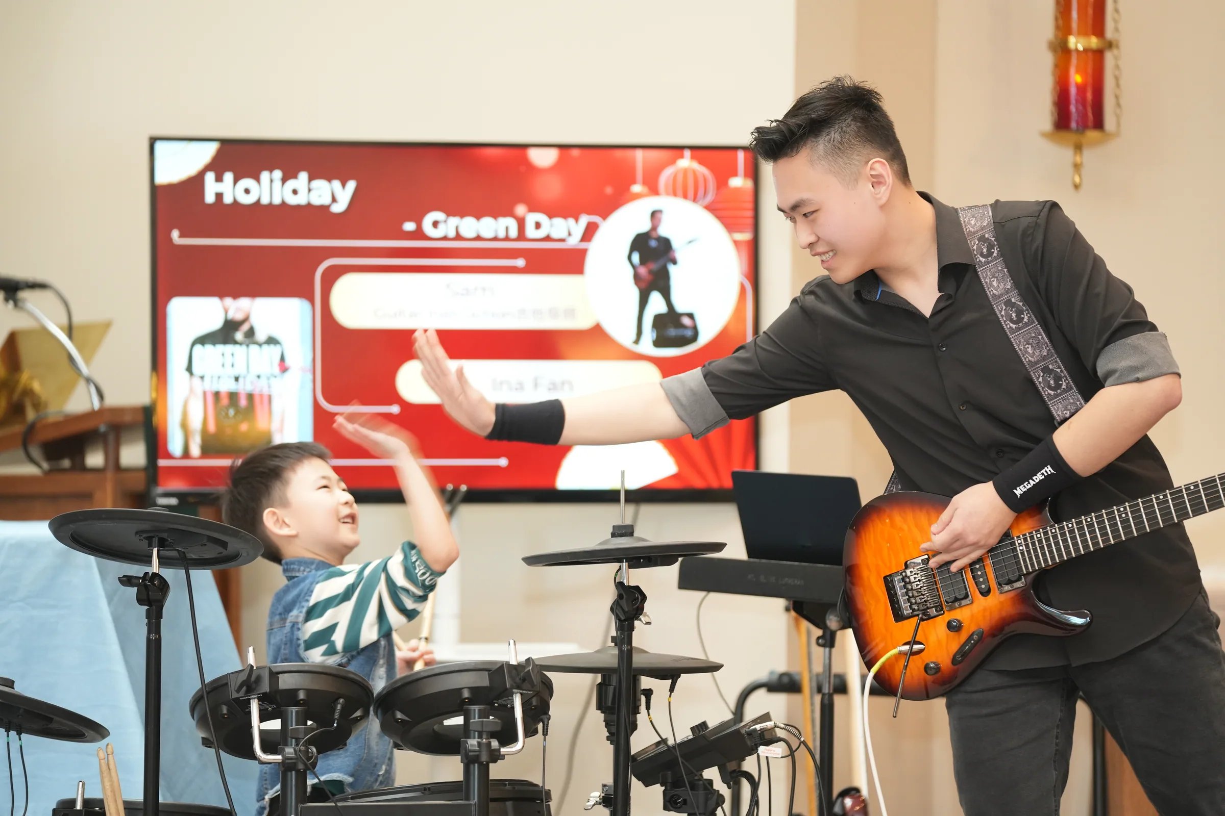 Student performance moment from Reindeer Education's 2025 public gallery.