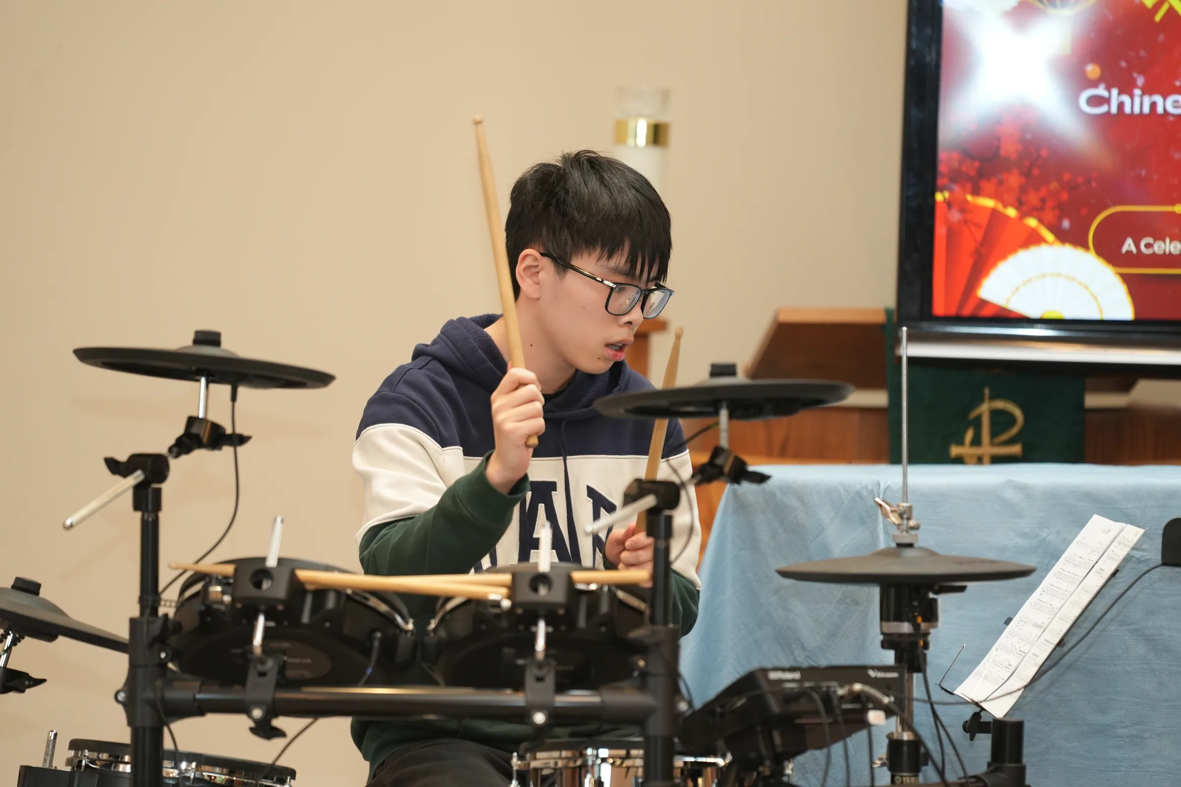 Student performance moment from Reindeer Education's 2025 public gallery.