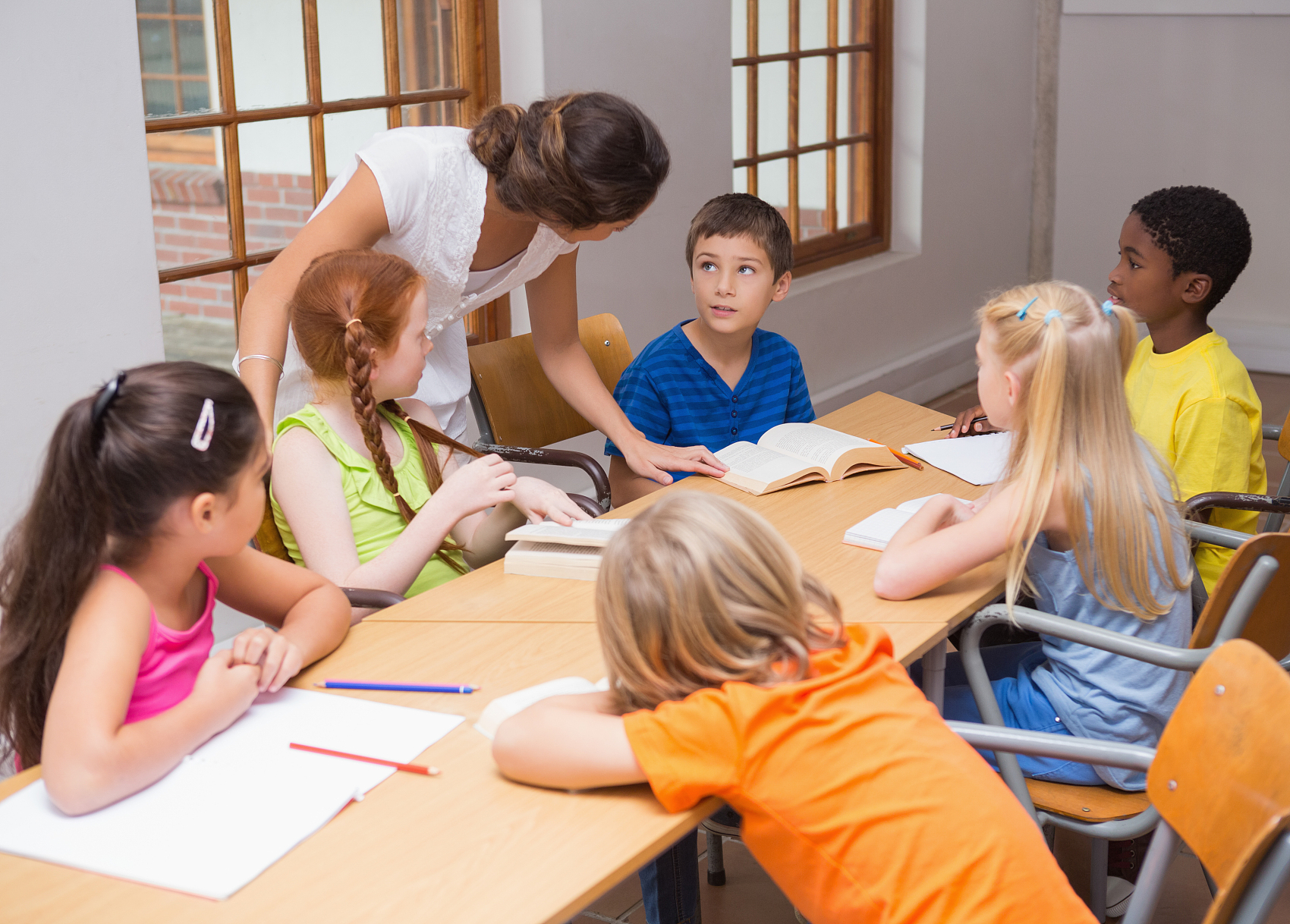 Children participating in a small group learning activity