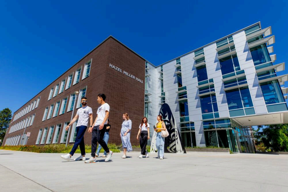 Students walking outside Hazel Miller Hall